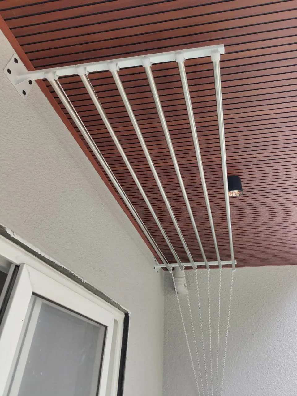 Pulley channel bracket mounted on ceiling
